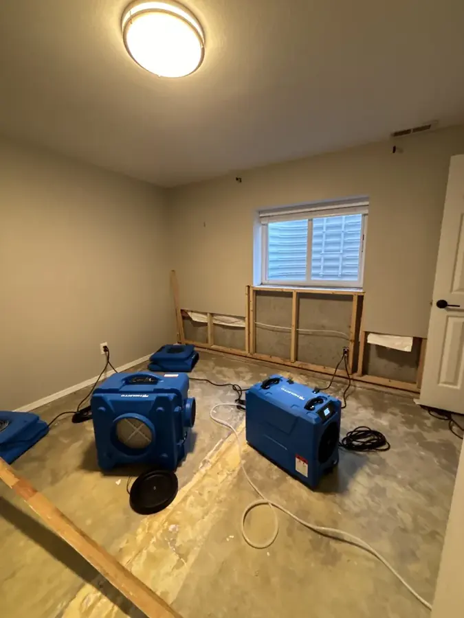 Dehumidifier drying a Colorado Springs lower level